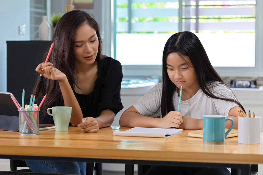 student and tutor together at a desk in Anaheim